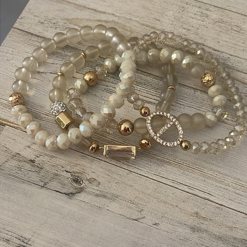 Off White/Smoky Beaded Four Strand Stretchy Gem/Charm Bracelet. - Picture 2 of 4